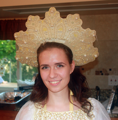 Liina Protsenkora wearing a Kakpshnik (head piece)