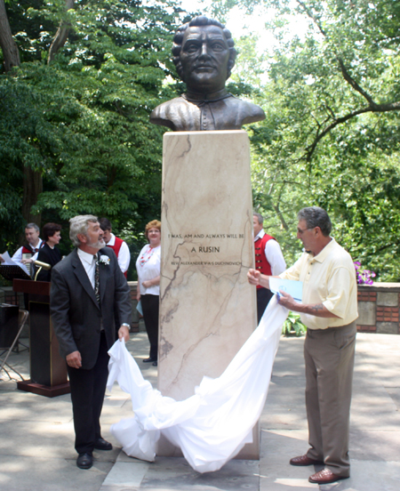 Bust of Aleksander Duchnovic unveiled by Paul Burik and John Krenisky in the Rusyn Garden in Cleveland