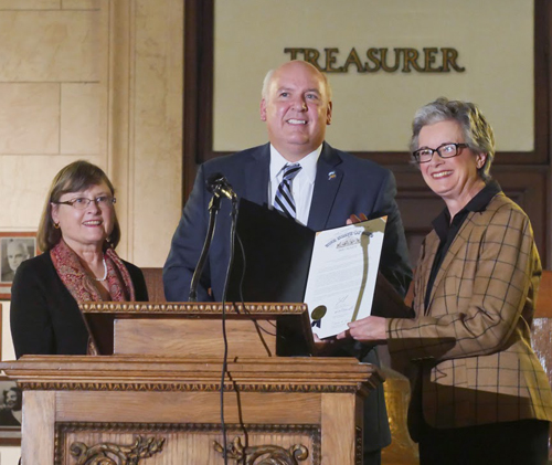 Marcia Benko, State Senator Michael Skindell and Laurel Tombazzi