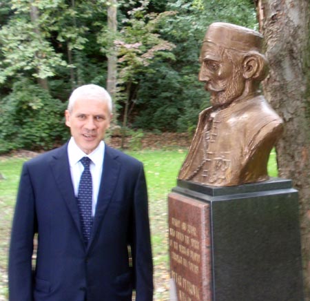 Serbian president Boris Tadic admires bust of Petar Petrovic Njegos 
