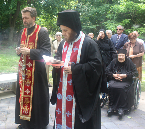 Rev. Zivojin Jakovljevic and Hieromonk Platon bless the Tesla statue