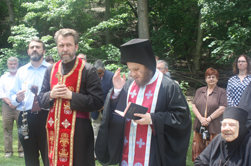 Rev. Zivojin Jakovljevic and Hieromonk Platon bless the Karadzic statue