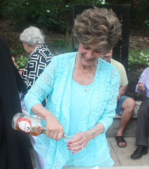 Carol Machaskee pours the Slivovitz