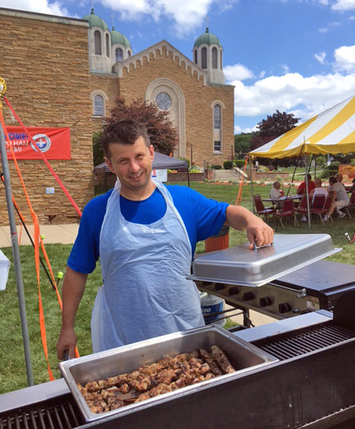 Grilling Serbian food at the SerbFest at St Sava in Cleveland