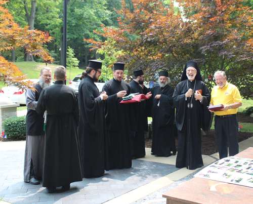 Clergy arriving in the Serbian Garden