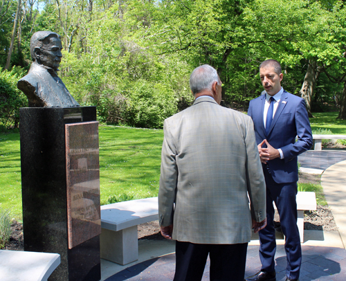 Serbian Ambassador Marko Djuric and Alex Machaseke with the bust of  Petar Njegos
