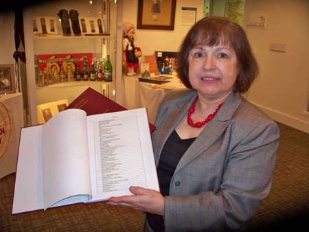 Ivana Yuko shows one of the Slovenian books