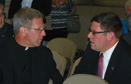 Father John Kumse and Councilman Joe Cimperman