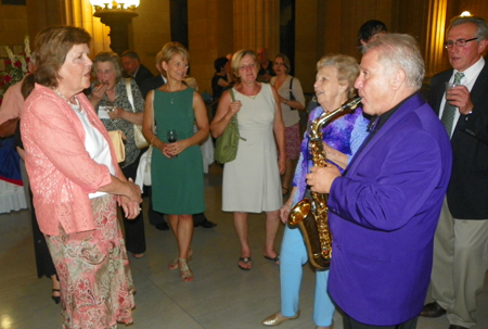 Cecilia Dolgan singing as Oto Vrhovnik plays the sax