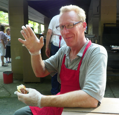 Guy eating Slovenian sausgae klobasa kielbasa