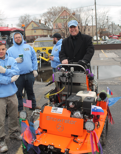 Councilman Mike Polensek on a Pirc Company snowplow