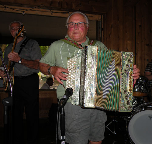 Ray Kovac of Warren, Ohio, entertains on his green vintage Mervar diatonic accordion 