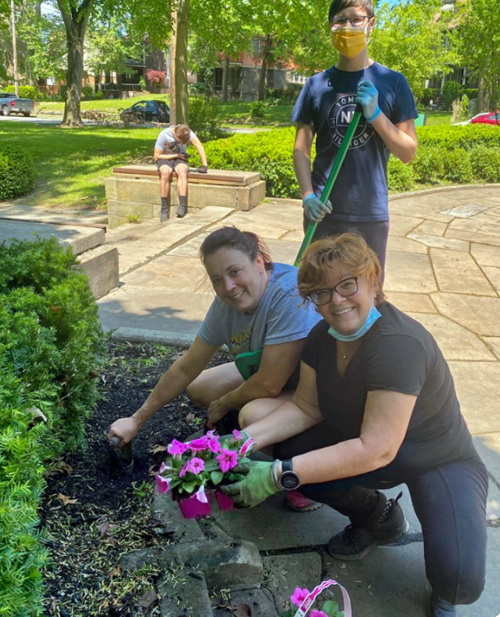 Consul General Alenka Jerak and others working in the Slovenian Cultural Garden