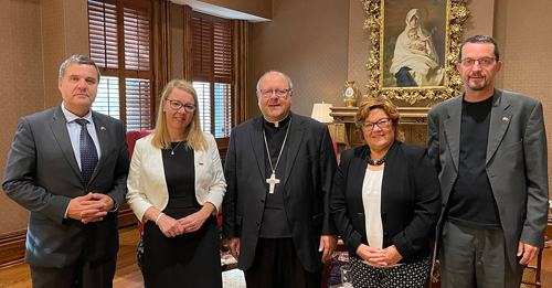 Slovenian Consul and leaders with Bishop Malesic