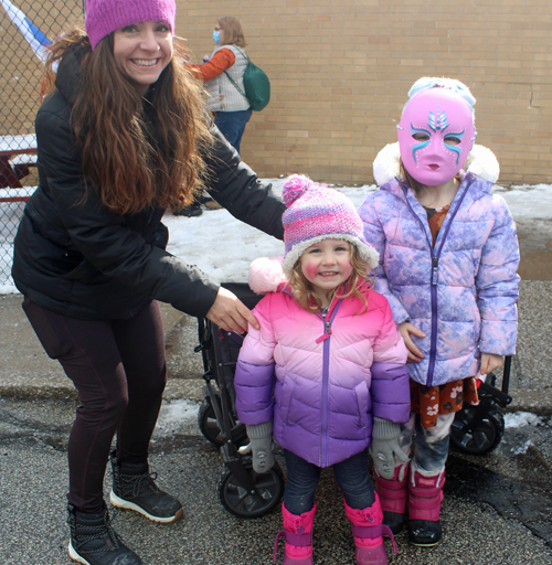 Slovenian Mom and  kids in costume at Kurentovanje