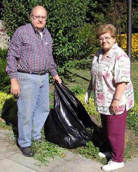 Chris and Joan Chermely work in Slovenian Garden