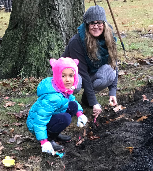 Planting tulips in the Turkish Cultural Garden in Cleveland Ohio