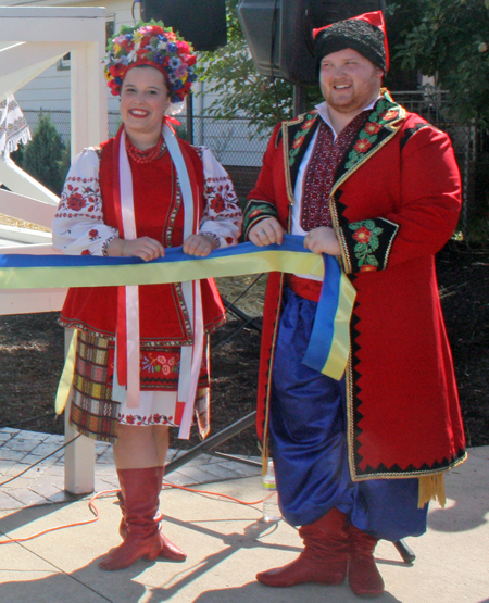 Holding the ribbon for the ceremony