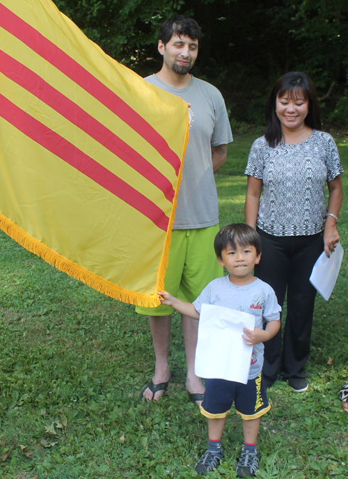 South Vietnam flag - boy, Will Sanchez and Oanh Loi-Powell