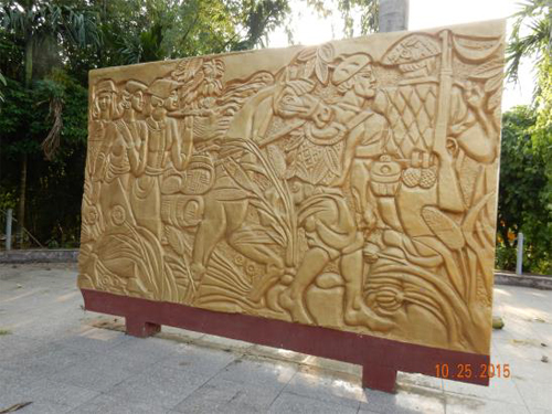 Memorial at altar dedicated to the Thai women and children killed by French bombers. This shows the Thai people joining with the Viet Minh after the French atrocity which they deny happened or apologize that this was just an accident