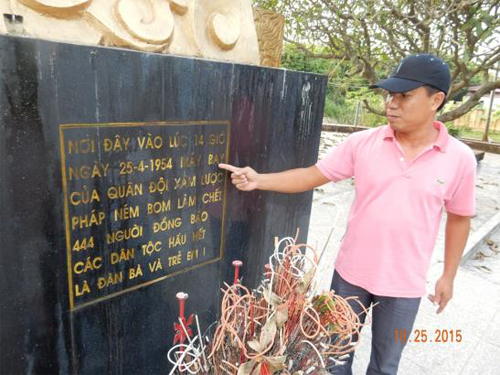 My Guide, Mr. Thin, points to date of French bombing of Thai women and children. 444 civilians were killed in this event.