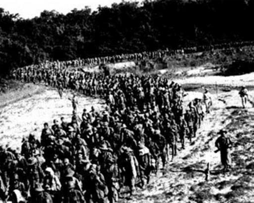 French and their Allied soldiers march off into captivity. Russian film director produced this propaganda piece. Many of the French soldiers did not survive this 