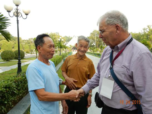 I meet Communist Veteran soldiers in a large Dien Bien Phu military cemetery.