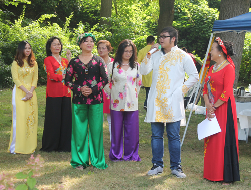 Members of Gia Hoa Ryan family speaking in Vietnamese Cultural Garden