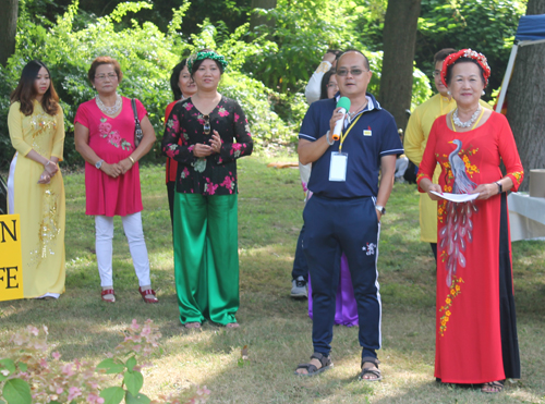 Members of Gia Hoa Ryan family speaking in Vietnamese Cultural Garden