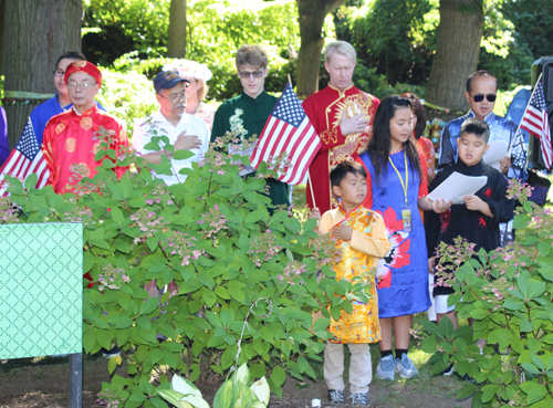 Singing the US and Vietnamese anthems on One World Day in Cleveland