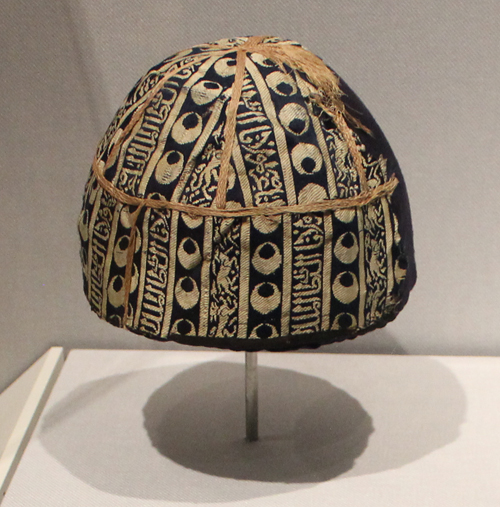 Cap with striped inscribed silk, 1300s. Egypt or Syria,