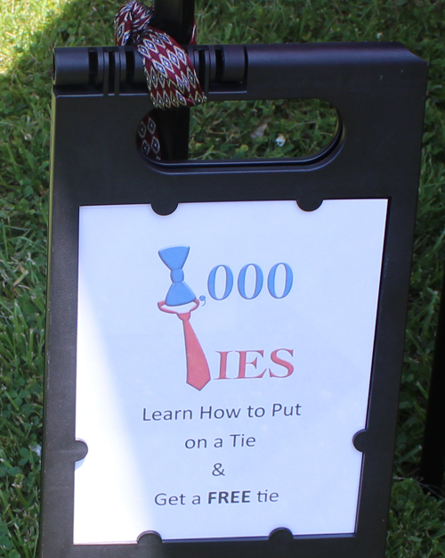 1000 ties sign