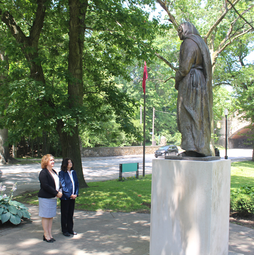 Ambassador Floreta Faber and Dona Brady gaze at Mother Teresa statue