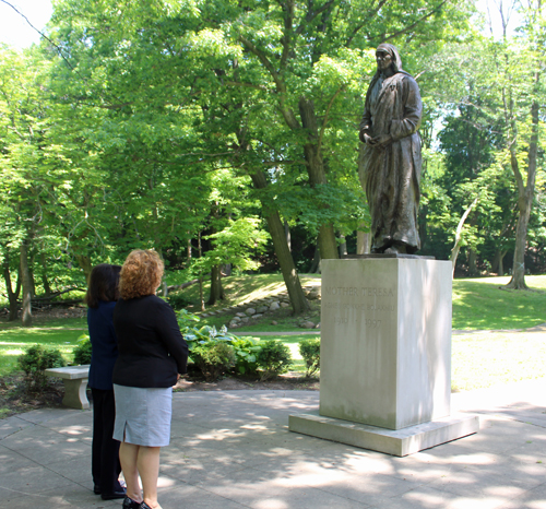 Ambassador Floreta Faber and Dona Brady gaze at Mother Teresa statue
