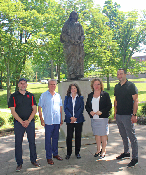 Ambassador Floreta Faber and Cleveland Albanian leaders at Mother Teresa statue