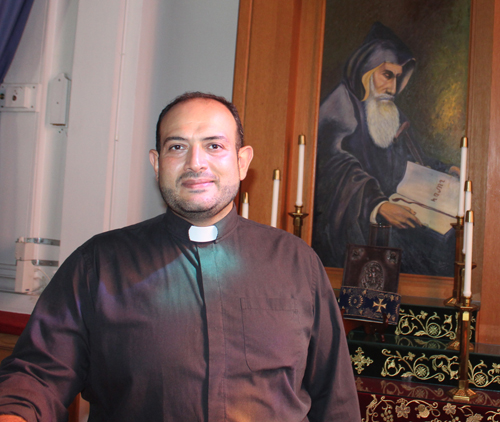 Rev. Fr. Hratch Sargsyan with icon of St. Gregory of Narek
