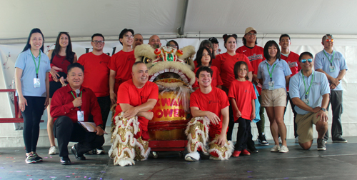 Kwan Family Lion Dance Team with CAF Board and Cleveland Guardians