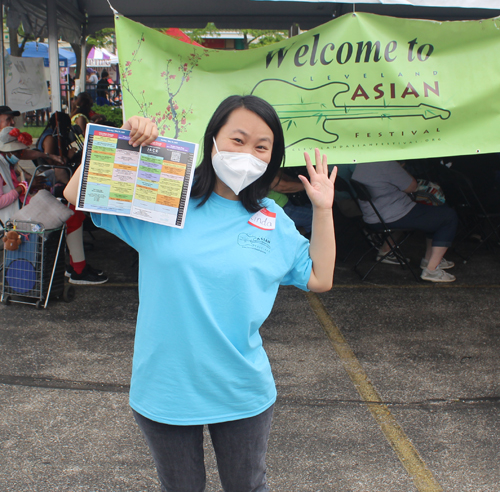 CAF Volunteer with book