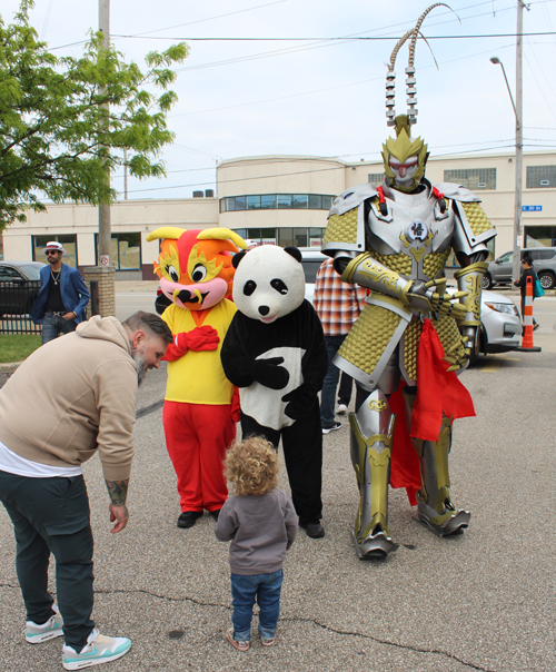 Posing with mascot at Cleveland Asian Festival