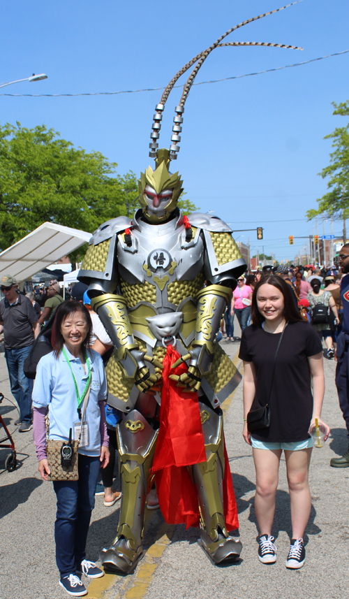 Debbie Yue Posing with mascot at Cleveland Asian Festival
