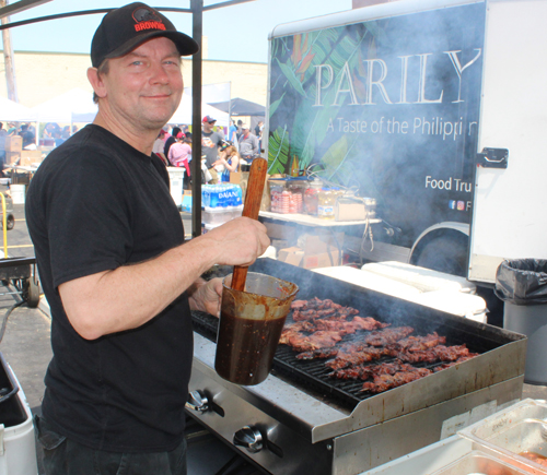 Grilling food at Cleveland Asian Festival