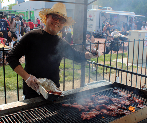 Grilling food at Cleveland Asian Festival