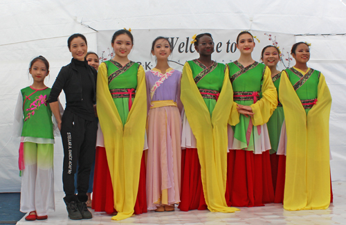 Young Chinese girls from the Stellar Acrobatic Dance Academy  with teacher