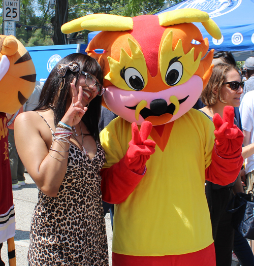 CAF mascot and girl
