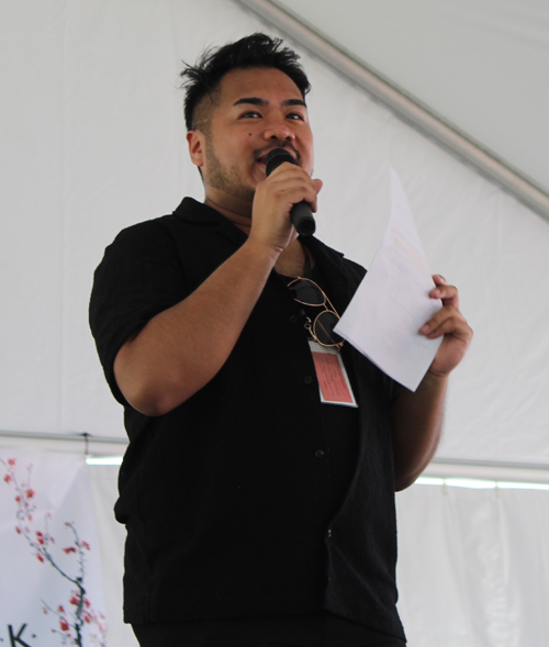 CAF speaking on stage