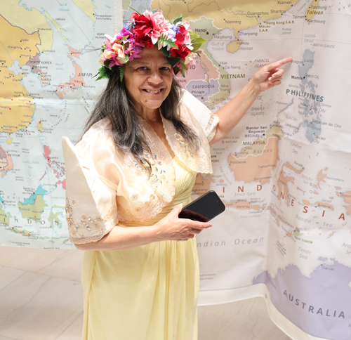 Rose Ferguson pointing to the Philippines