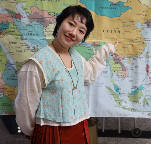 Pointing to map of China