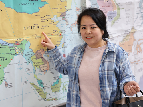 Pointing to map of China