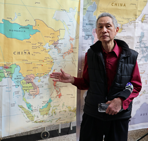 Pointing to map of China
