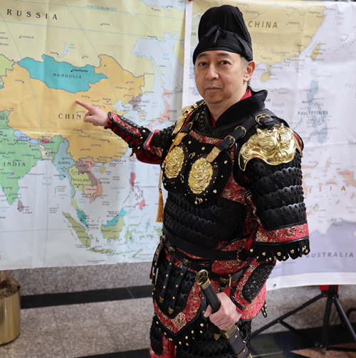 Pointing to map of Silk Road Source in China